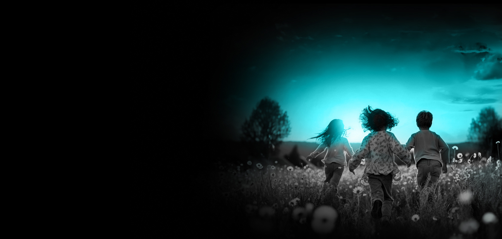 Children running in a flower field