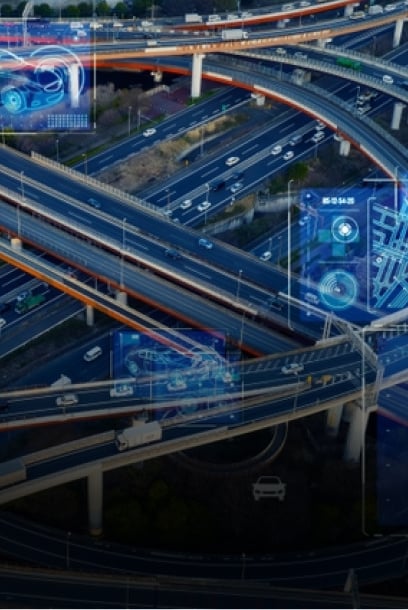 An aerial view of smart transportation networks with visual overlays, emphasizing advanced automotive technologies.
