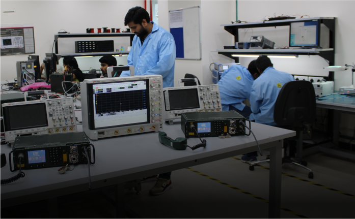 Engineers working in RF & Communication Lab, showcasing innovation hubs at Cyient.
